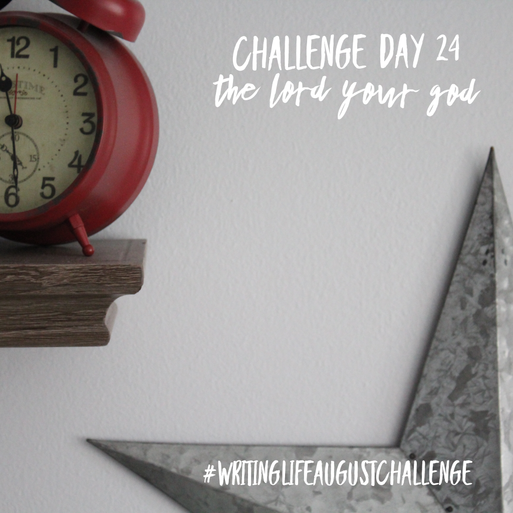Shelf with old fashioned, red alarm clock sitting on it in top left-hand corner; blank wall in middle; galvanized steel star hung on the wall in bottom right-hand corner. Photo text: Challenge Day 24, the Lord your God. #writinglifeaugustchallenge